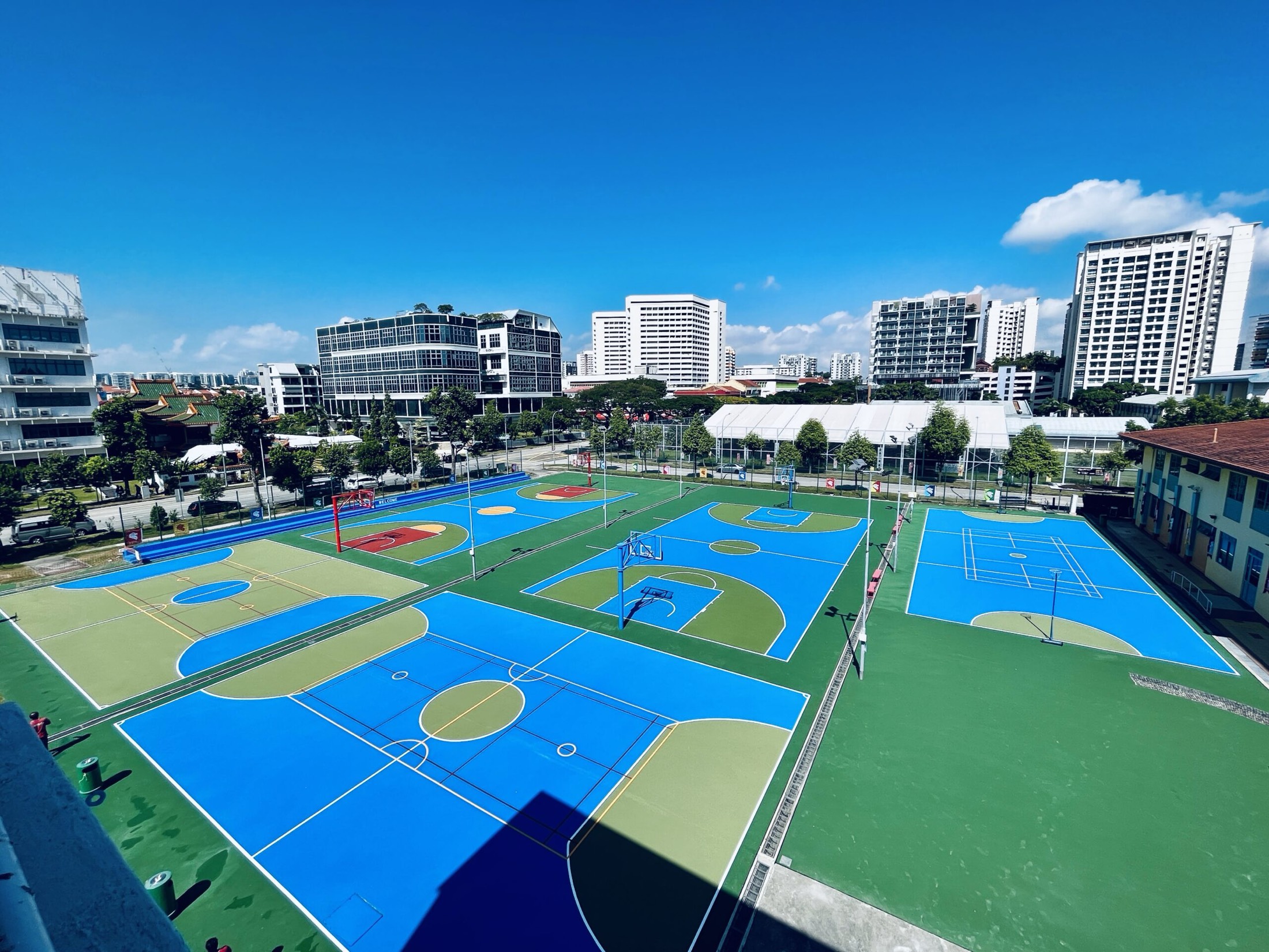 Aerial view of a multi-court sports surfacing project completed by Parklab in Singapore